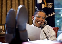 Obama with feet on the desk
